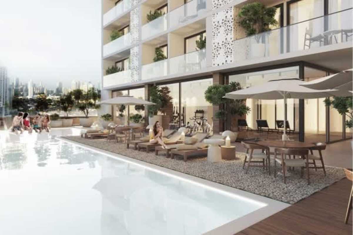 Private balconies with seating glass railings overlooking city in PH Smart Suites San Francisco Panama