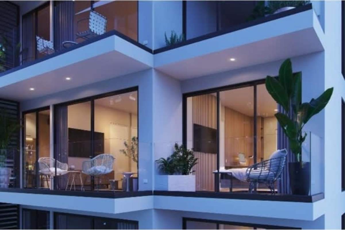 Modern fitness center with cardio and weights at PH Smart Suites San Francisco Panama