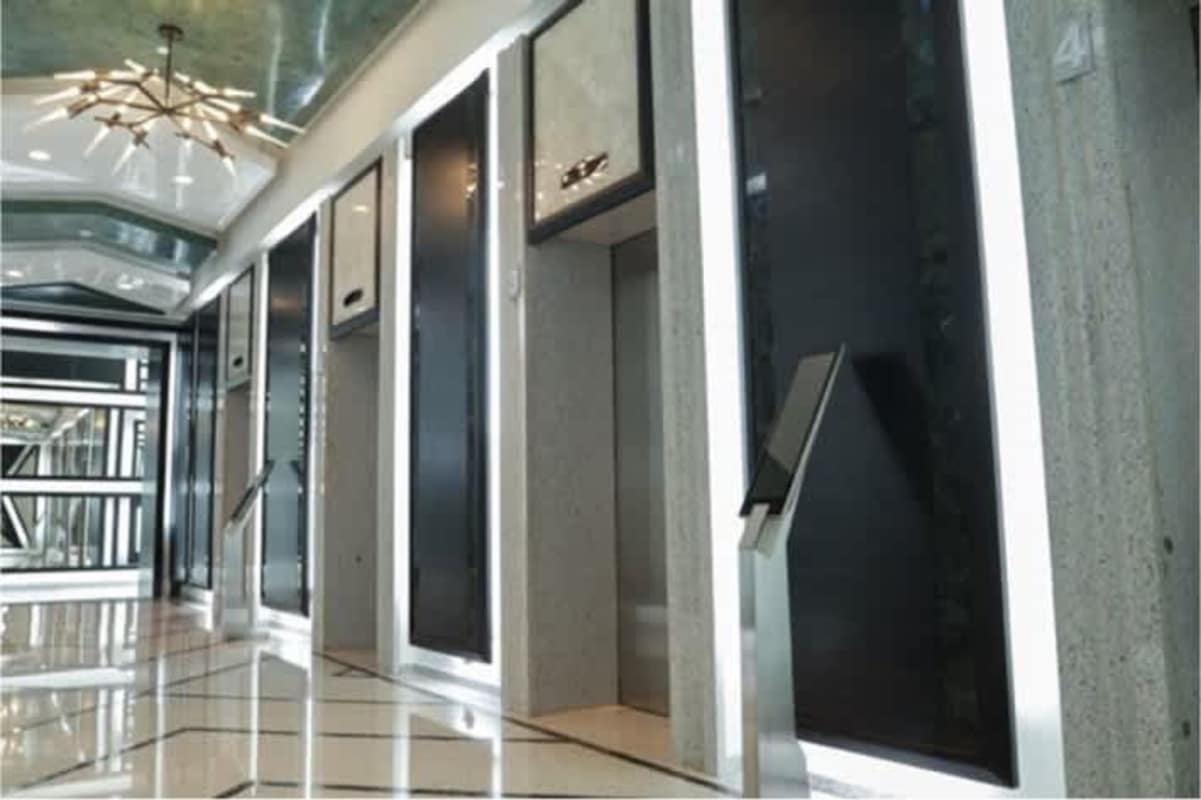 Elevator lobby with modern finishes and LED lighting at PH BICSA Financial Center Panama City
