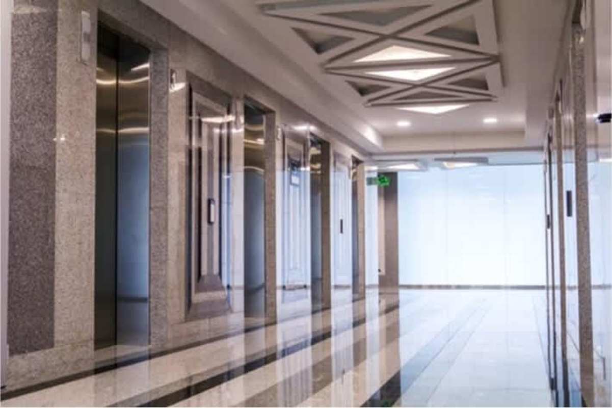 Polished lobby area with elevators inside PH BICSA Financial Center Panama