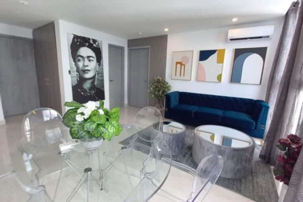 Modern bedroom with AC, ensuite bathroom, city skyline view at The Sands Panama City