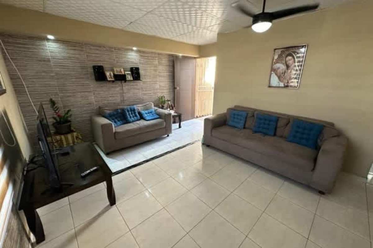 Bedroom with built-in closet AC window at house Vista del Valle Villa Lucre Panama