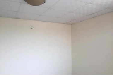 Simple white room drop ceiling tile floor PH Doña Ana Panama