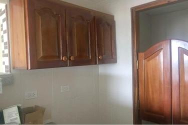 Kitchen with wooden cabinets and tiled backsplash PH Doña Ana La Chorrera Panama