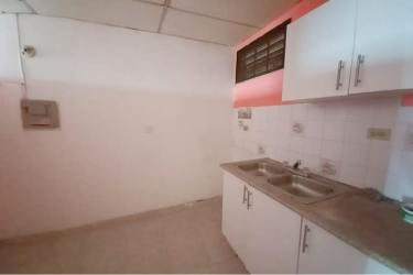 Living and dining combined area, tiled floor, bright walls in PH Doña Ana La Chorrera