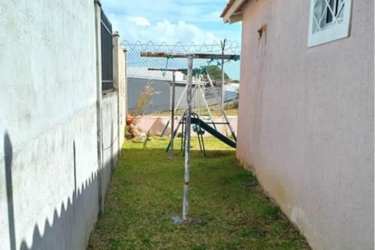 Modern living room with sectional sofa and kids play area in Verde Real La Chorrera Panama