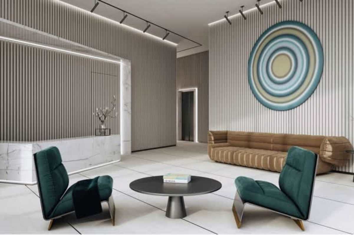 Elegant dining area with floor-to-ceiling windows and panoramic ocean front views in Ocean Reef Islands apartment Panama