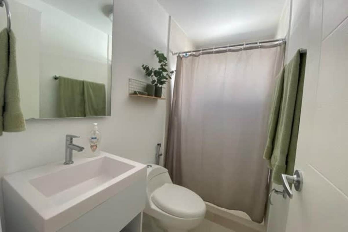 Bright bedroom with large closet and window in Panama Viejo Residences Juan Diaz Panama