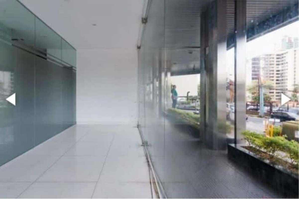 Empty commercial retail space with glass walls and city view Obarrio Panama