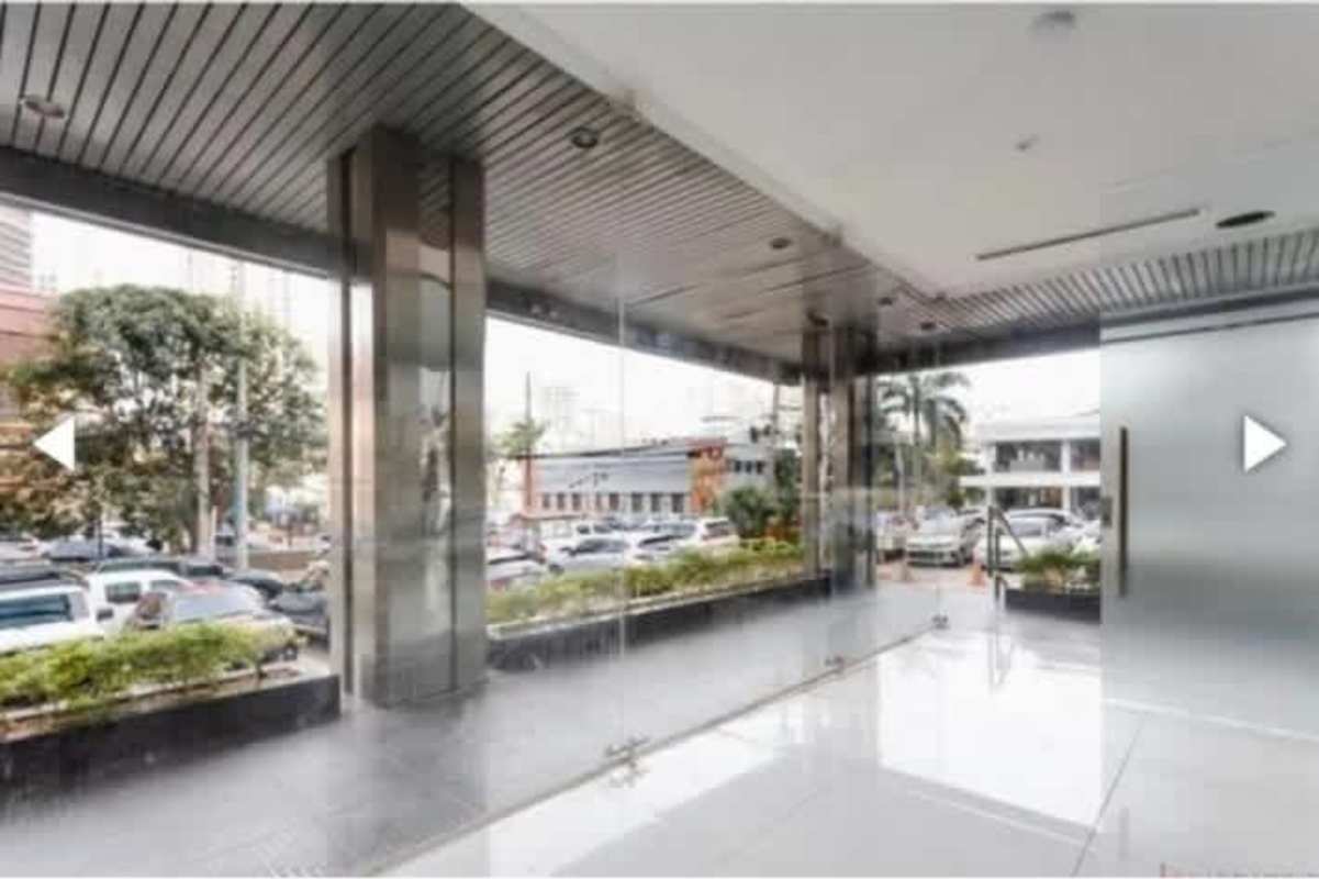 Glass-walled modern lobby of Obarrio commercial property in Panama City
