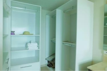 Modern penthouse living room with large screen TV and ocean view at Bijao Beach, Cocle