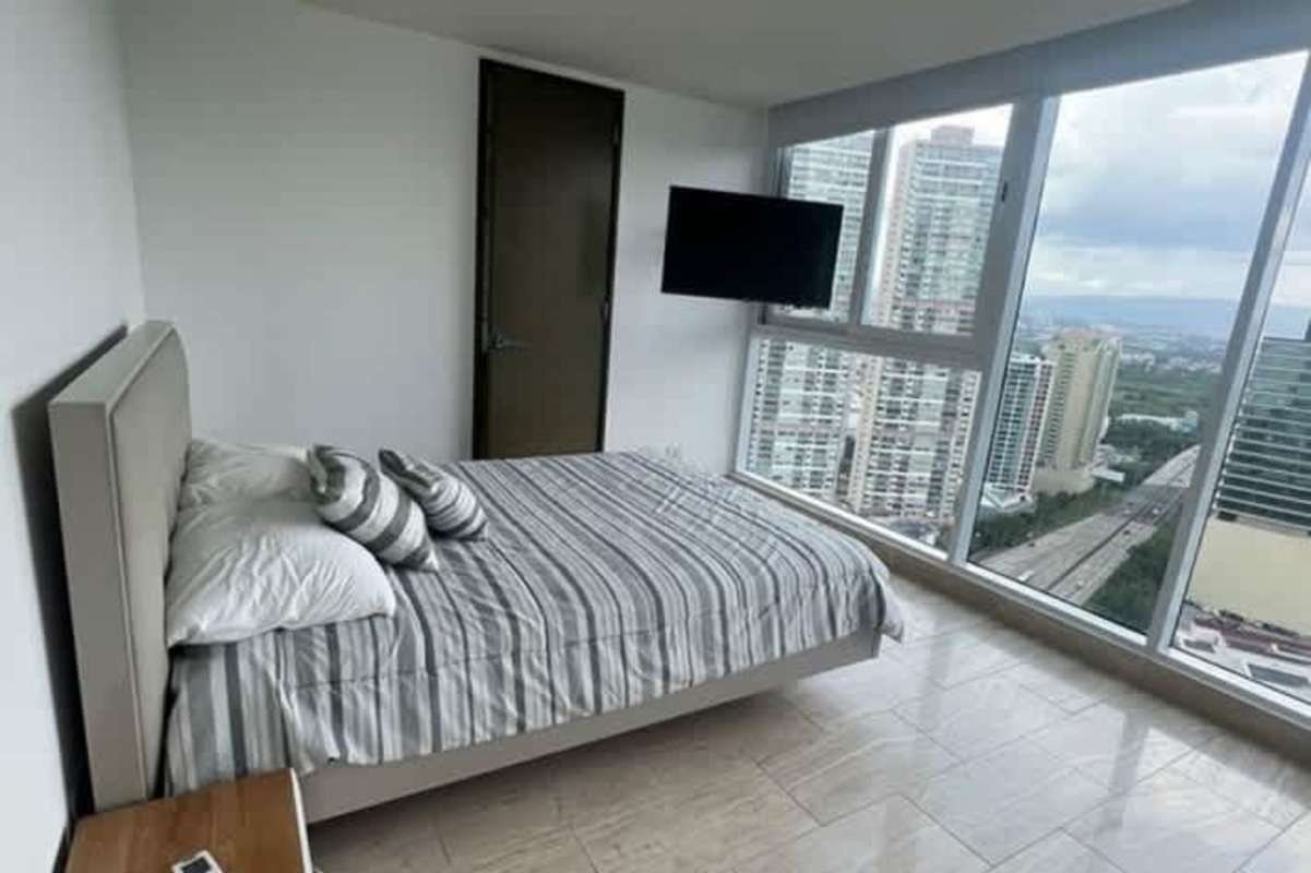 Modern bathroom with glass enclosed shower vanity PH Grand Tower Costa del Este