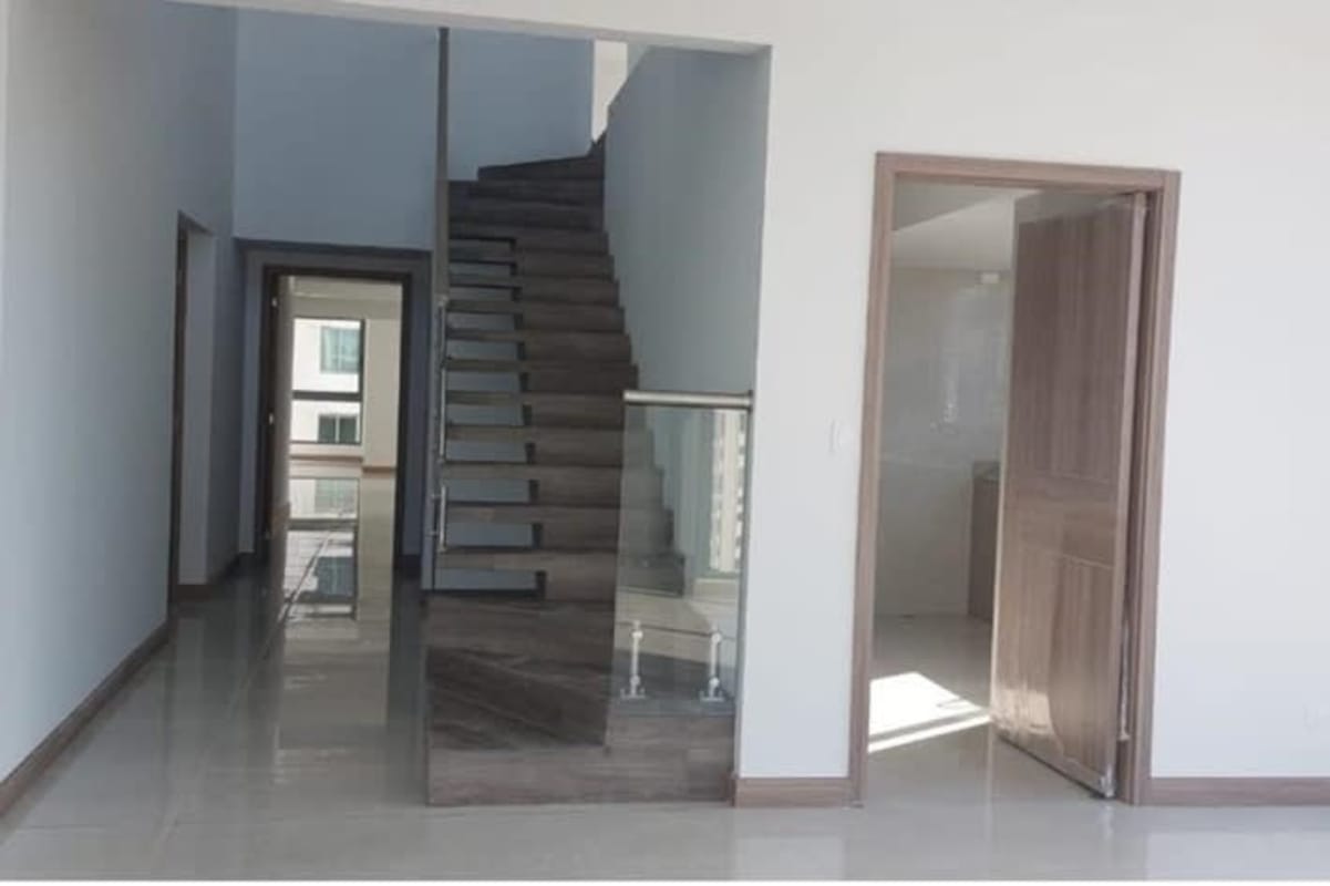 Stunning open terrace with glass railing and city skyline views in Bella Vista luxury high-rise Panama