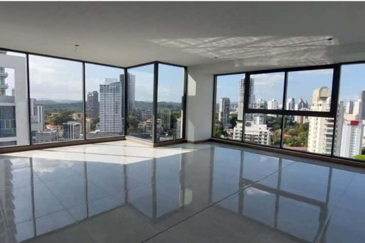 Rooftop terrace with glass railing and skyline views of Panama City luxury condo