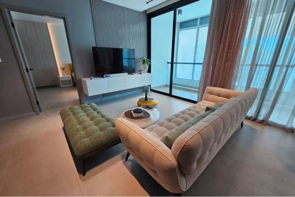 Bedroom with designer furnishings and city skyline views PH Marvela Marbella Panama