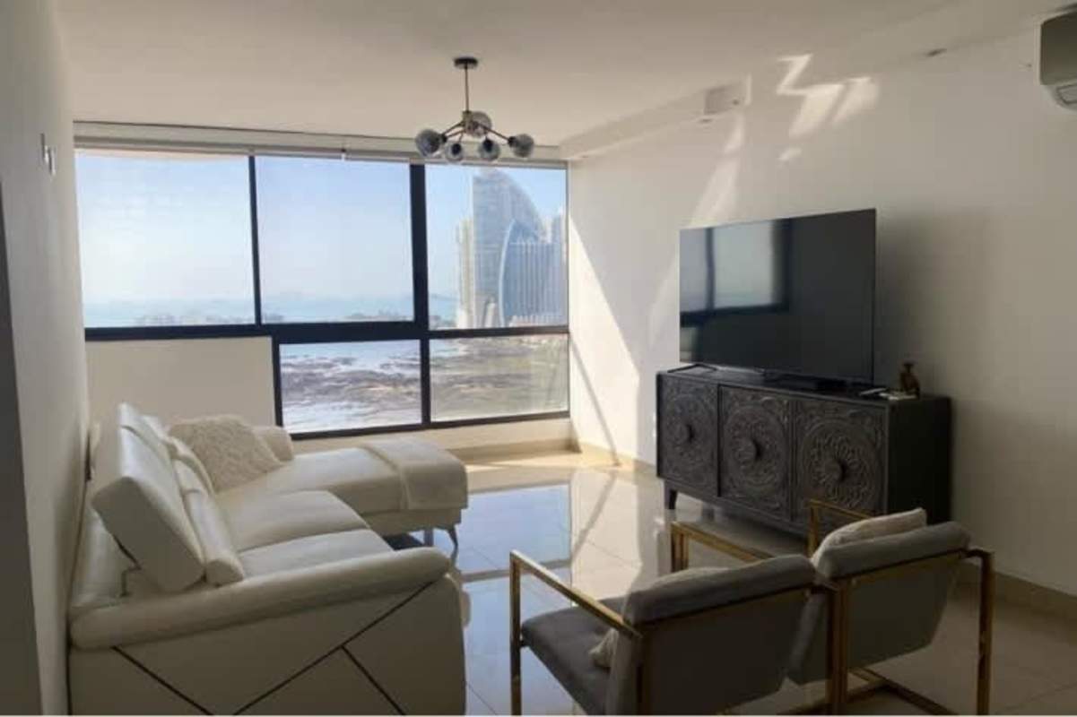 Master bedroom with large windows, city and ocean view at San Francisco Bay Tower 500 Panama City