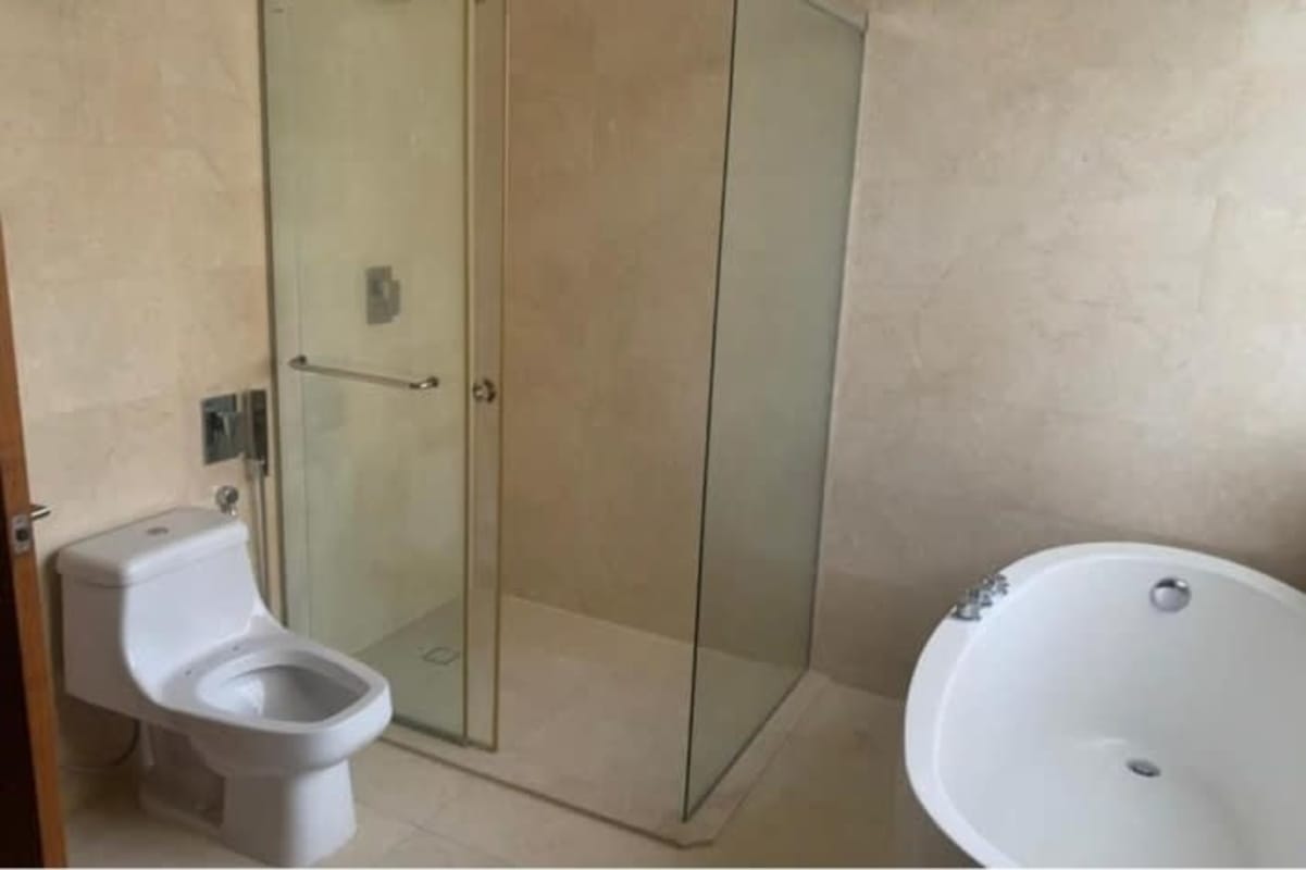 Elegant ensuite bathroom with glass shower enclosure in PH Oceania Costa del Este Panama
