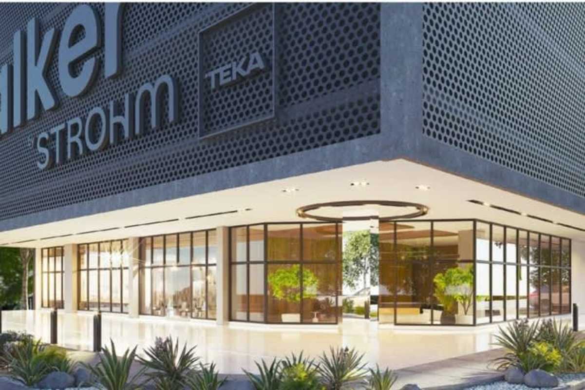 Modern high-rise glass facade of PH The Walker with landscaped entrance Avenida Balboa Panama