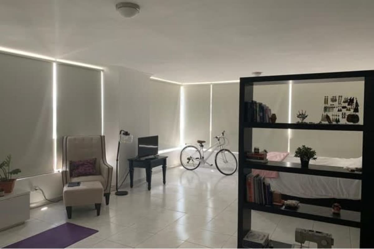 Bright dining area with work nook and skyline ocean views in PH BICSA luxury apartment Panama