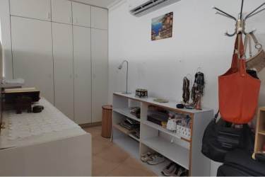 Master bedroom featuring panoramic ocean views from large window at PH Casas del Sol Coronado Panama