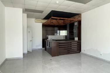 Minimalist small bathroom with toilet and sink in Playa Blanca commercial unit