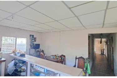 Outdoor laundry and utility space with sink in commercial house Barrio Balboa