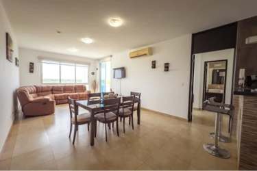 Equipped kitchen with breakfast bar, stainless appliances at Playa Blanca Resort condo Panama