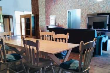 Comfortable living area with accent wall and TV Coronado Panama