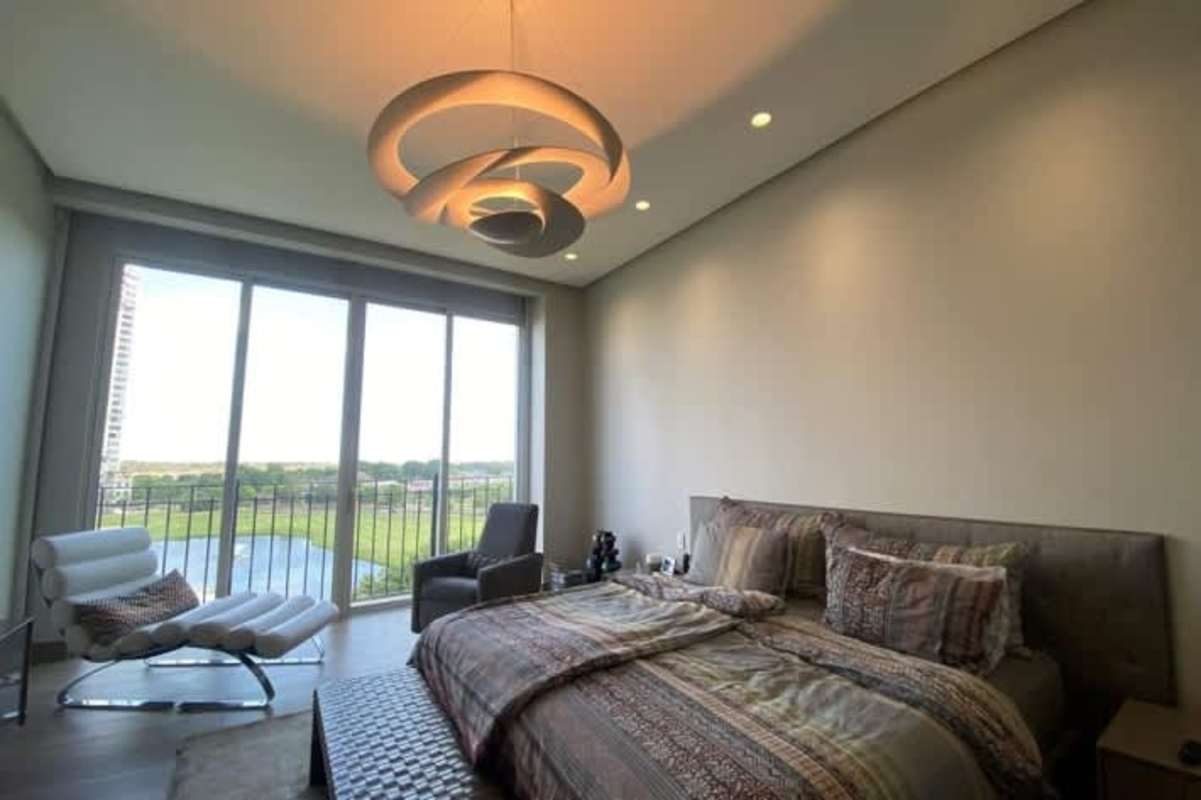 Modern glass enclosed wine cellar with stainless racks at The Reserve Santa Maria Panama