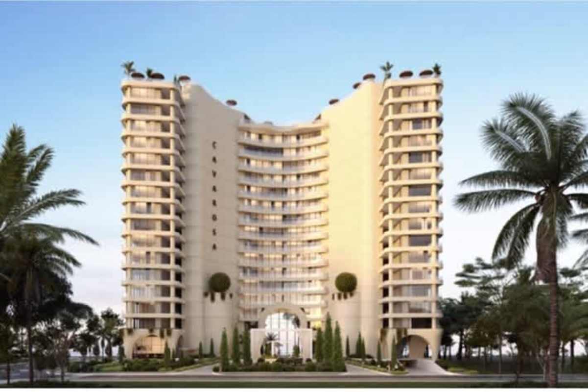 Luxury high-rise tower with curved balconies and lush landscaping at PH Cava Rosa Panama