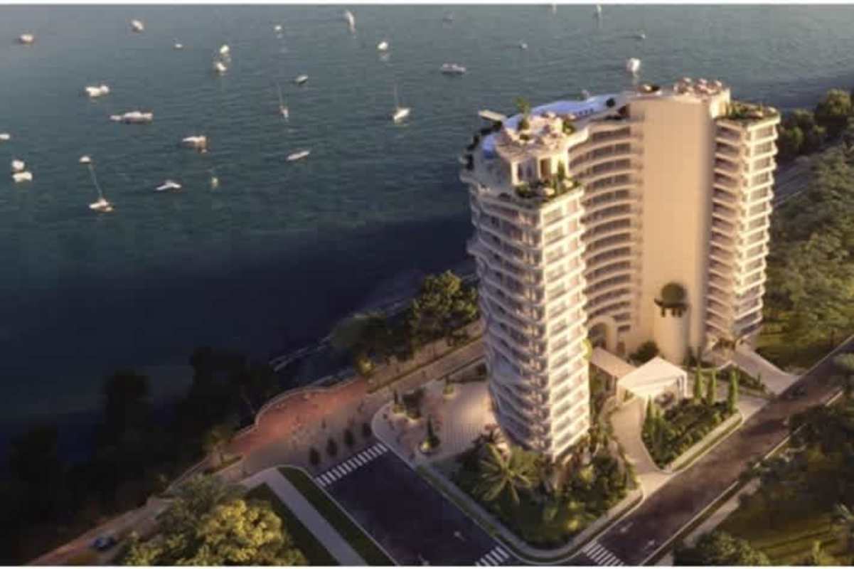 Aerial view luxury waterfront condos marina curved balconies landscaping PH Amador Marina Club Panama