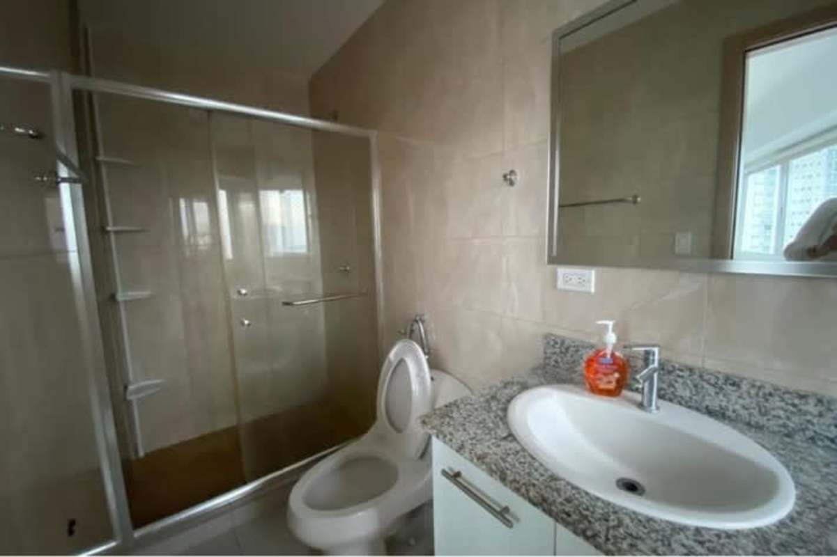 Dining space with panoramic window city skyline at PH San Francisco Park Panama