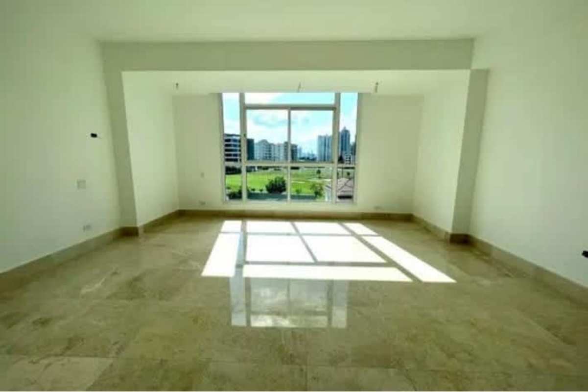 Bright living dining room with marble floors and panoramic windows at Santa María Golf Country Club Panama