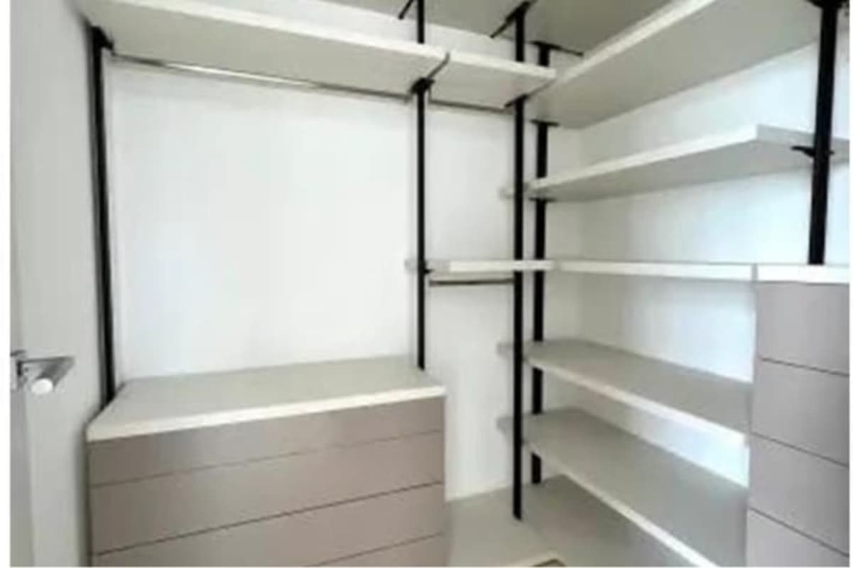 Elegant bathroom with double sinks, marble finishes walk-in shower Santa Maria luxury apartment Panama