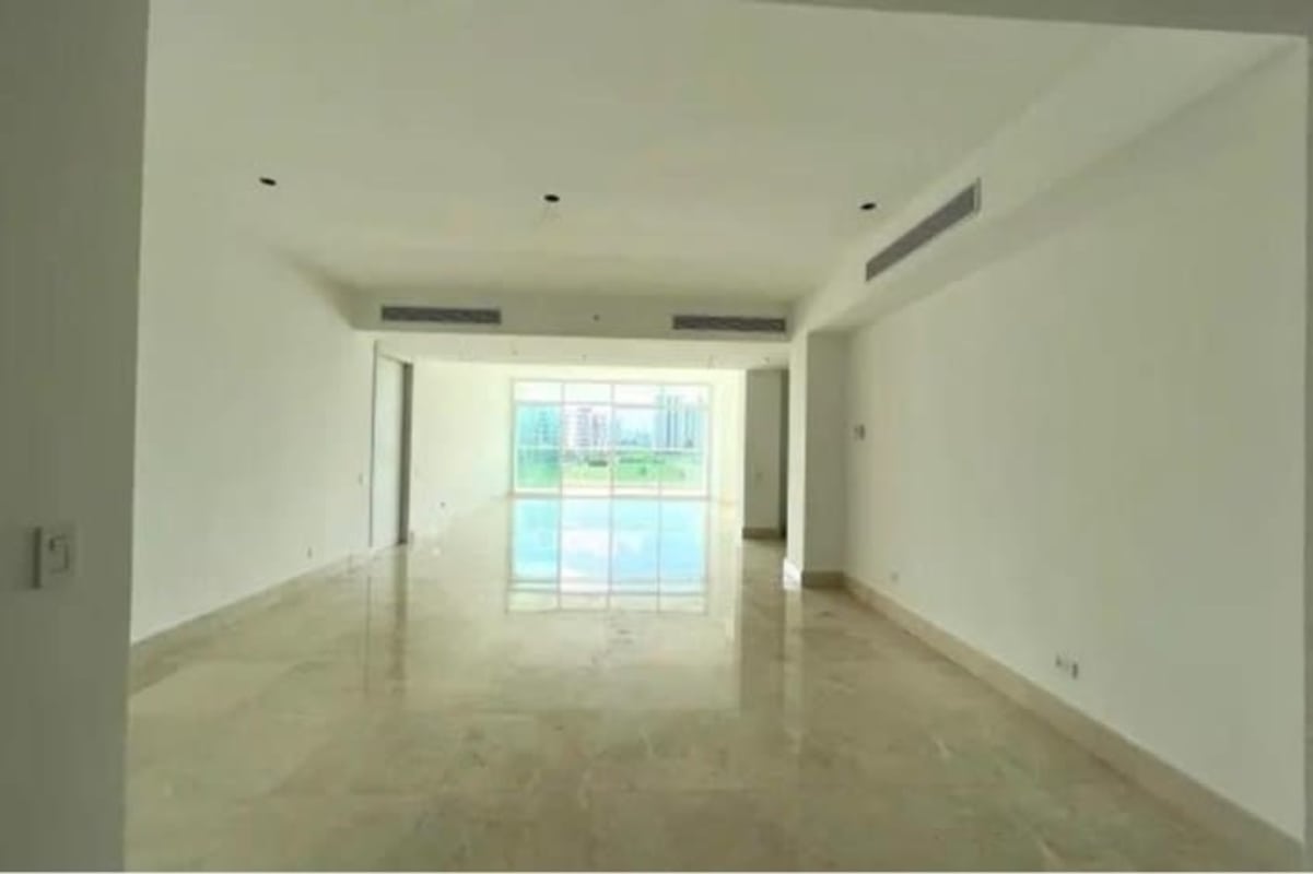 Spacious kitchen with European cabinetry marble floors built-in appliances Santa María Golf Panama