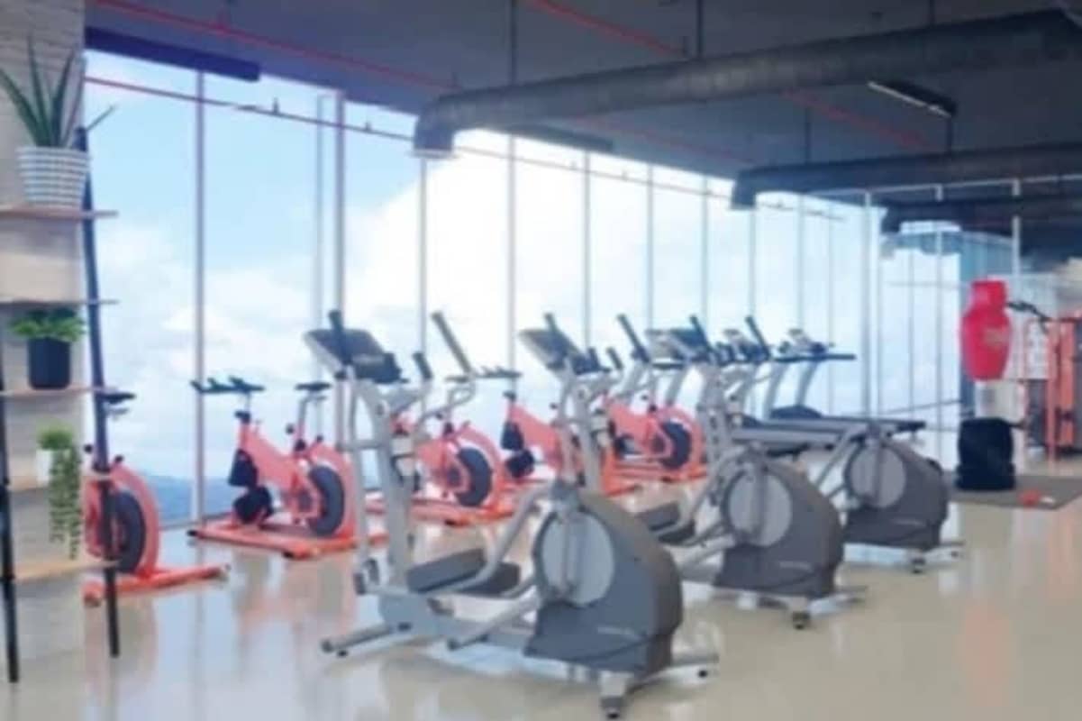Gym with large windows overlooking skyline at PH Generation Tower Costa del Este Panama