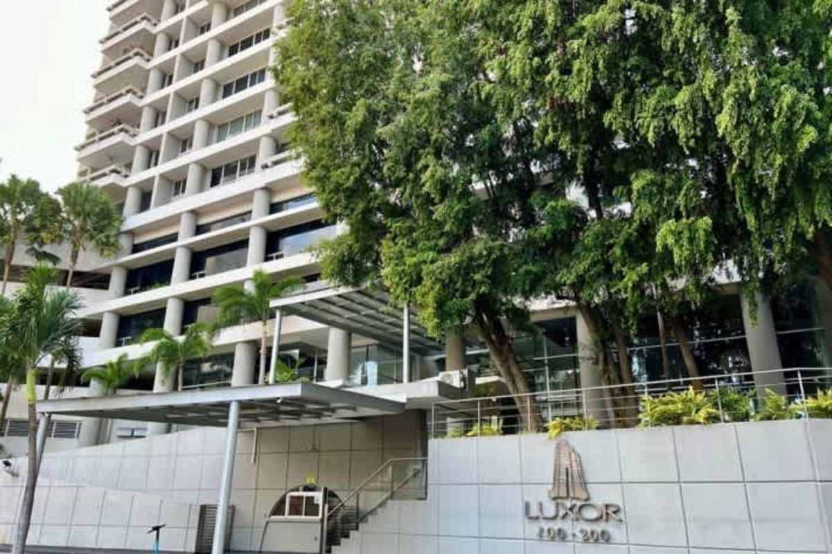 Tall PH Luxor Tower with glass windows and balconies El Cangrejo Panama