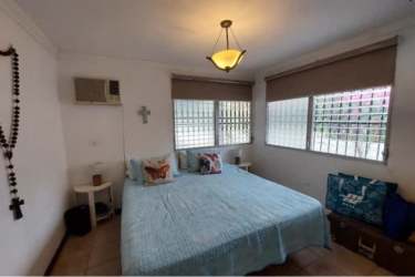 Private pool area with patio seating, hammocks, and picnic table in Coronado Panama beach house