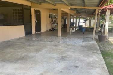 Spacious covered patio with concrete floor and metal roofing at Bejuco countryside property Panama