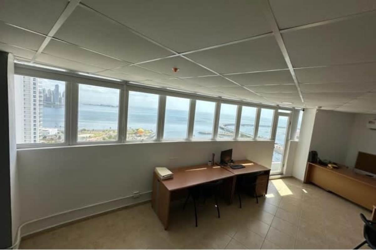 Bright open plan workspace in PH Bay View featuring panoramic ocean and Casco Viejo views