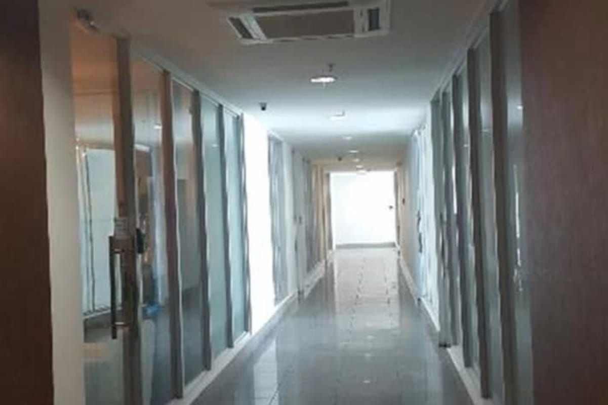 Glass wall corridor inside PH Top Tower commercial office in Costa del Este Panama