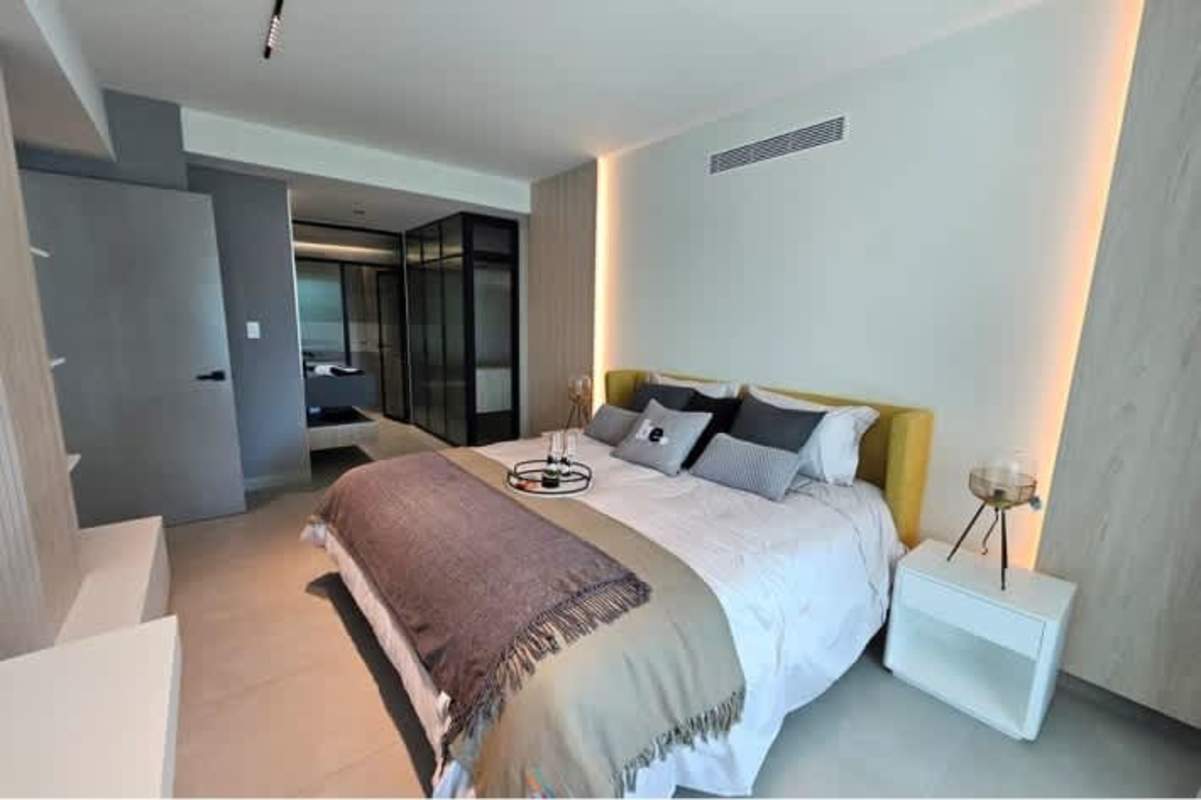 Bedroom with glass wardrobe, premium decor, accent lighting PH MARQUEE Panama City
