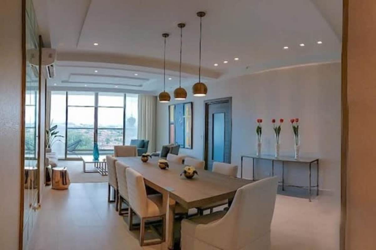 Contemporary kitchen with sea view window, quartz counters in luxury condo Costa del Este Panama