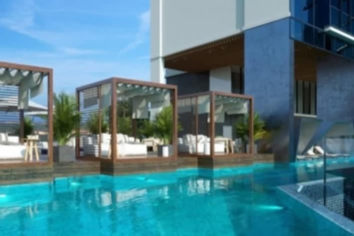 Contemporary furnished living space with neutral palette in one bedroom apartment Generation Tower Panama