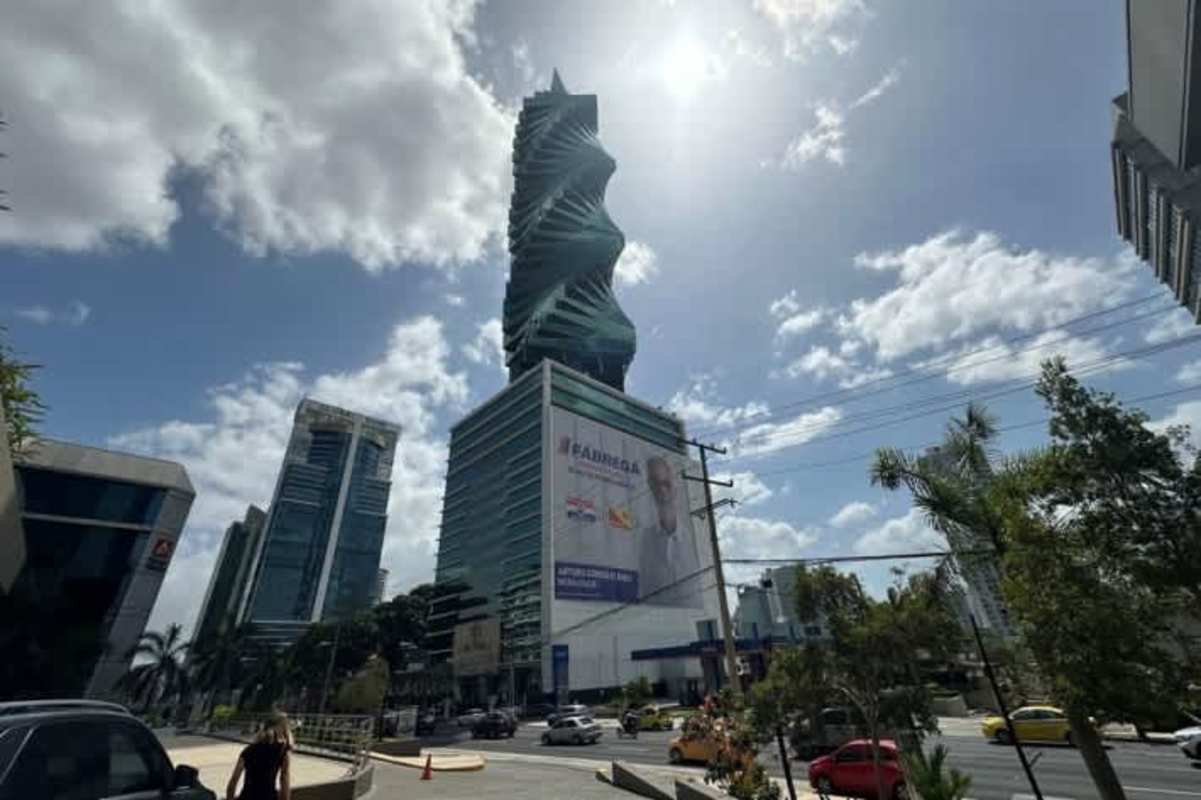 Eye-catching twisting shape of Revolution Tower (FF Tower) along Calle 50 skyline Panama City