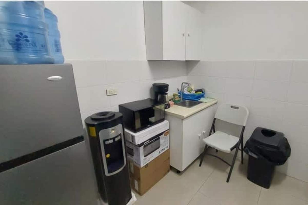 Modern lobby and elevator area with turnstiles commercial tower Obarrio Panama