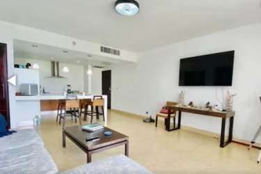 Kitchen with appliances and breakfast bar inside Nikki Beach condo Playa Blanca