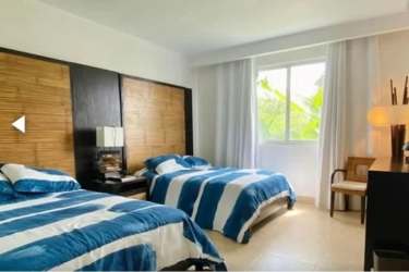 Second bedroom with twin beds garden view Nikki Beach Playa Blanca Panama