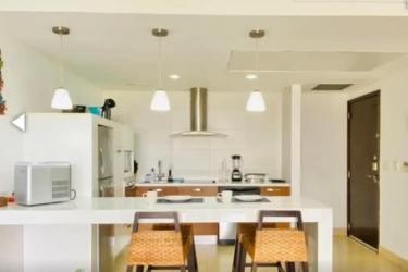 Beautiful sandy beach and palms in Playa Blanca Nikki Beach Panama