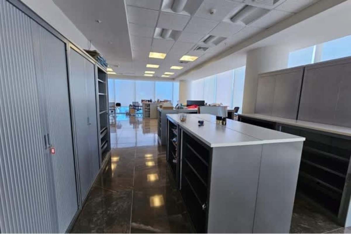 Office work desks with office chairs and glass partitions in Ocean Business Plaza Punta Pacifica Panama